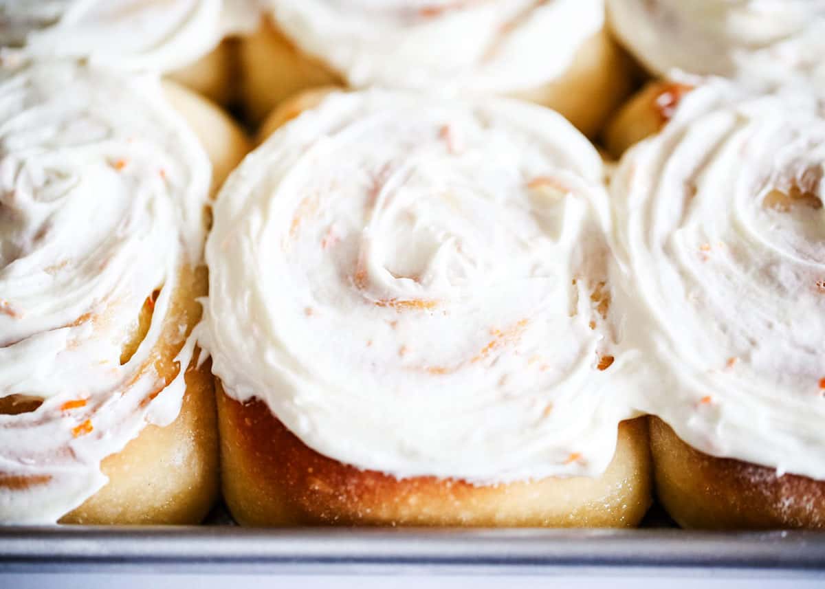 Orange rolls on a pan. 