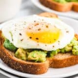 Sunny side up egg on avocado toast.