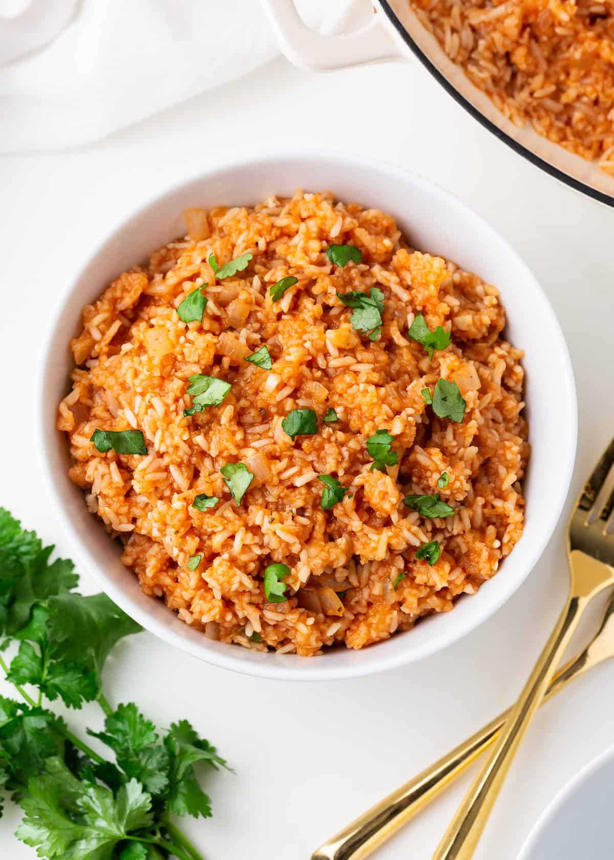 Easy Mexican rice recipe in a white bowl.