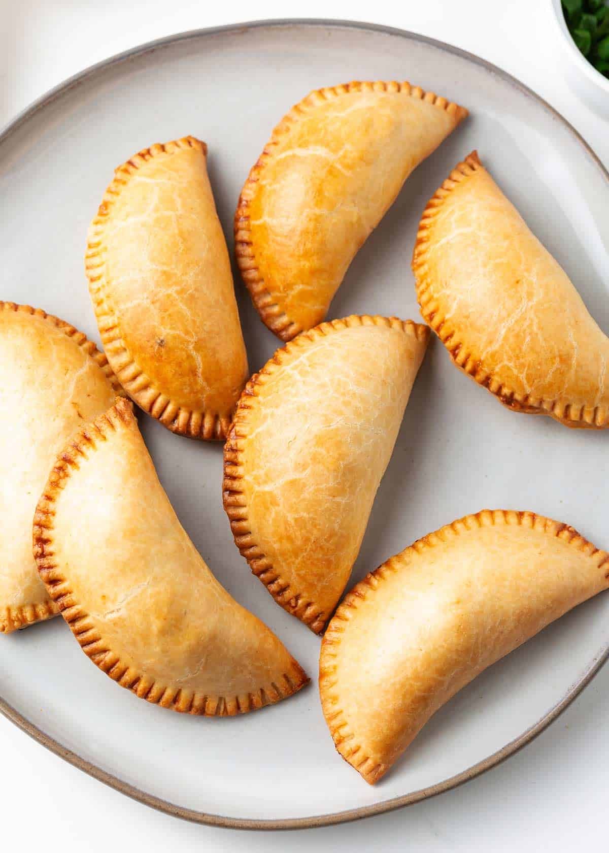 Empanadas on a plate.