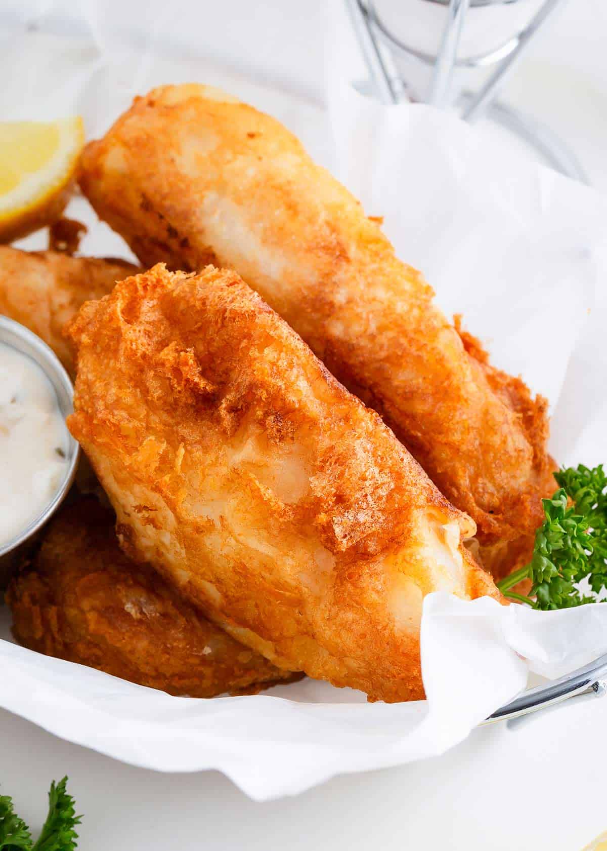 Fish and chips in a basket.