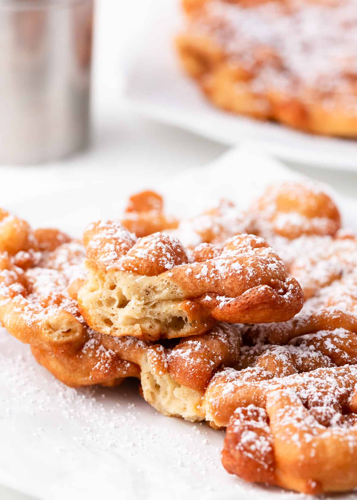 Funnel cake on a plate.