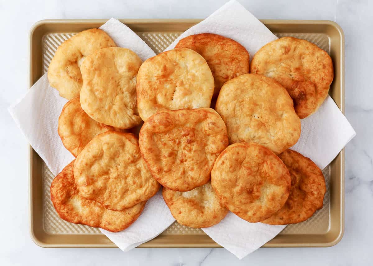 Indian taco fry bread on a cookie sheet. 