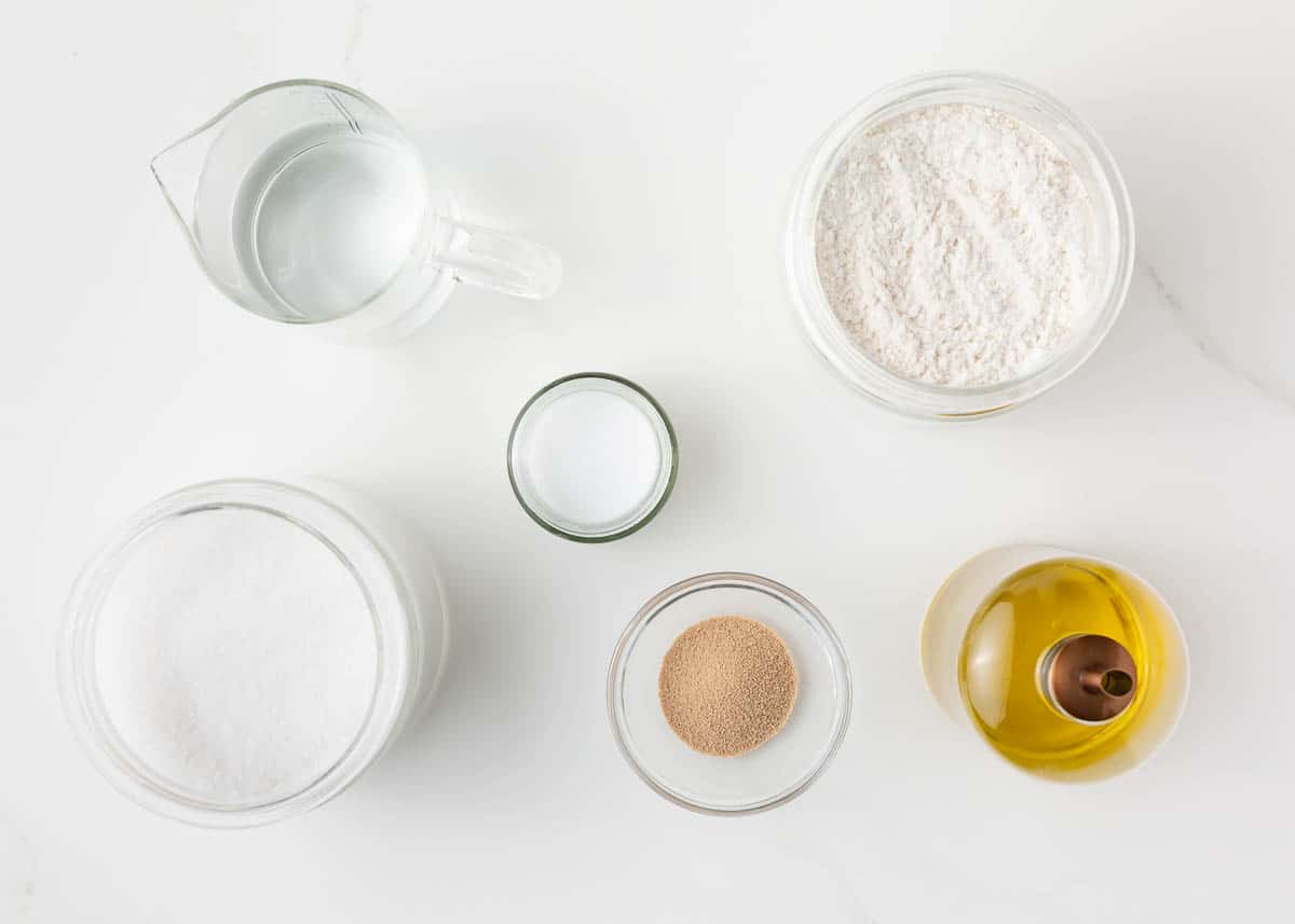 Pizza dough ingredients on counter.