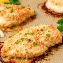 Cooked ranch chicken on baking sheet.