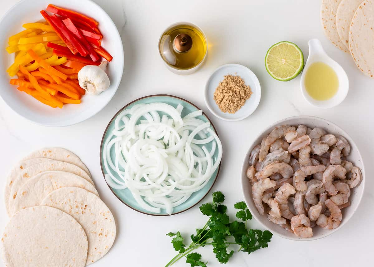 Shrimp fajitas ingredients on the counter.