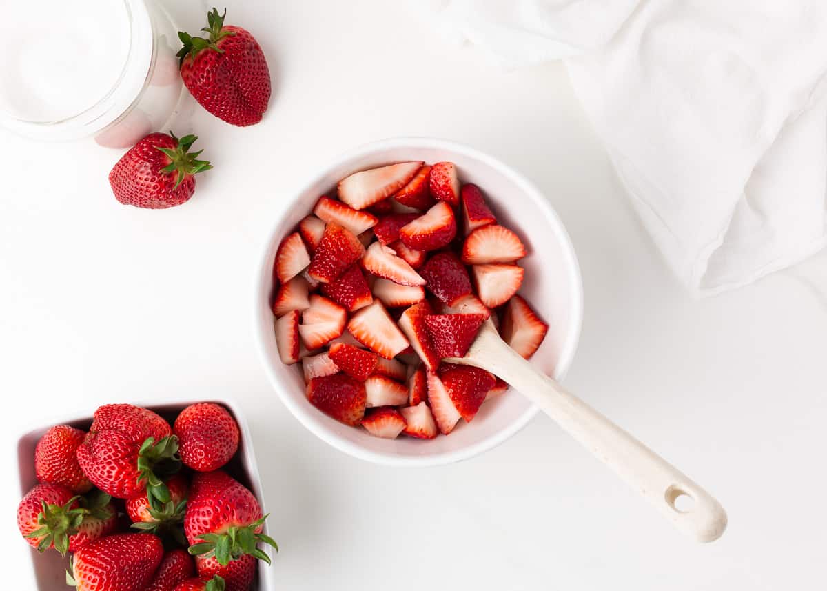 Bowl of strawberries on a bowl. 