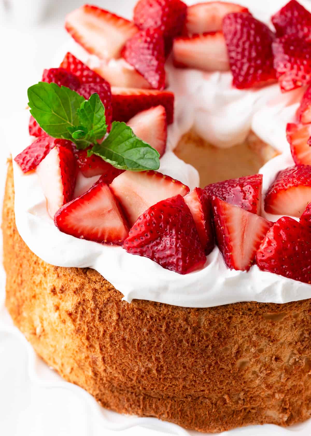 Strawberry shortcake on a white platter.
