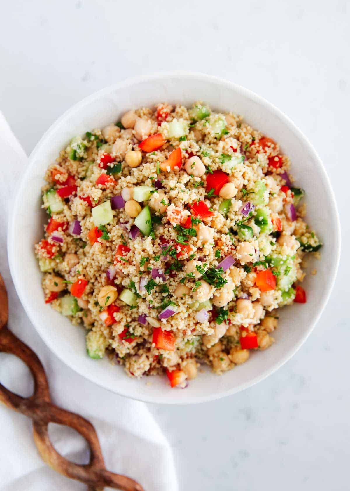 Couscous salad in a white bowl. 