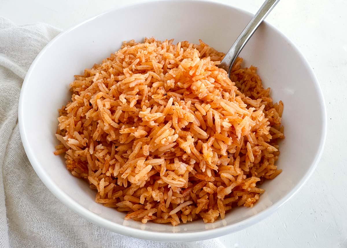 Mexican rice in a white bowl. 