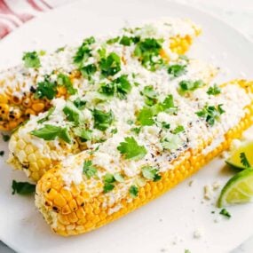 Mexican street corn on a plate.