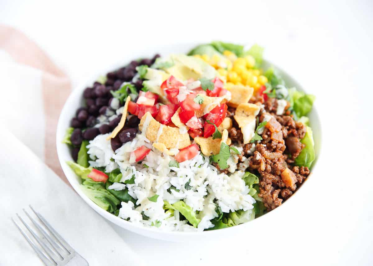 Taco salad in a bowl on counter.