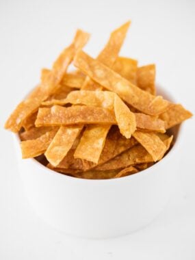 Homemade tortilla strips in a bowl.