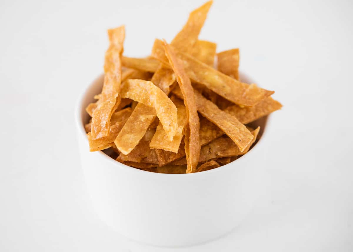 Tortilla strips in a white bowl. 