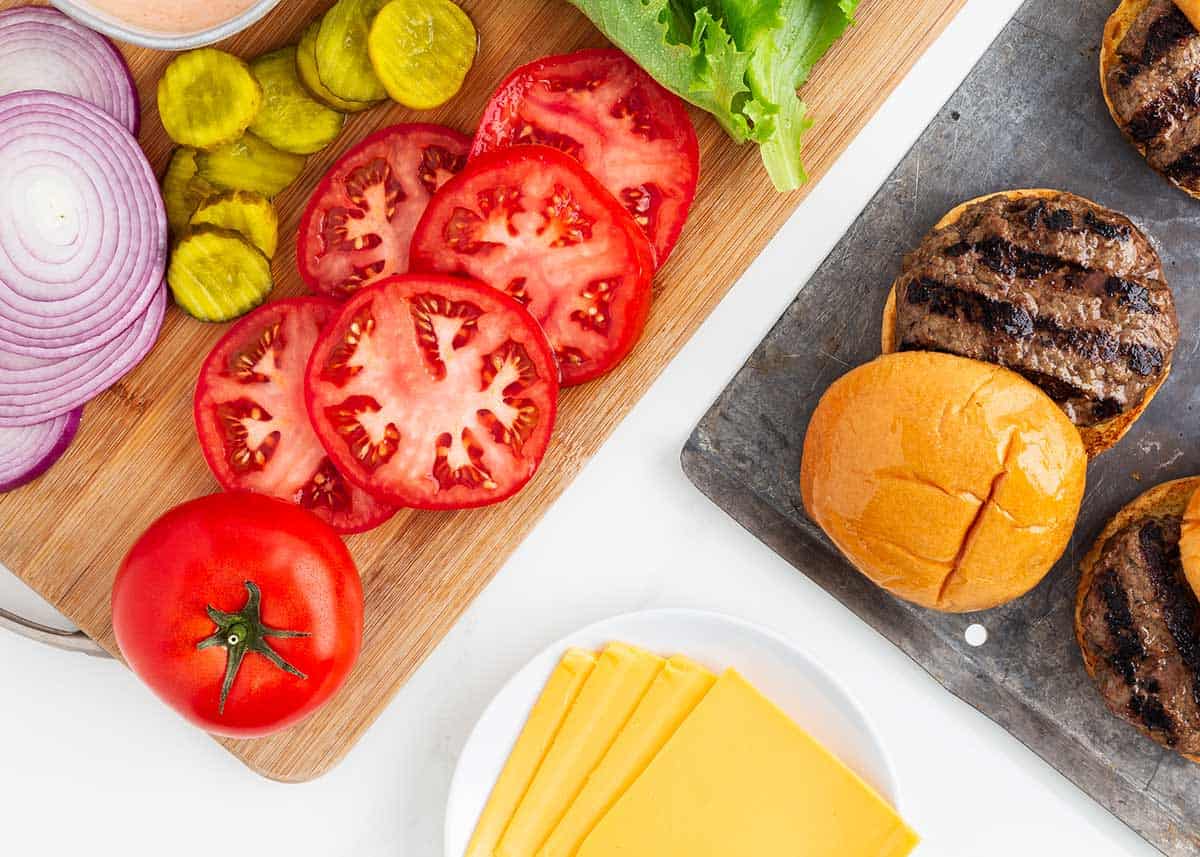 Cheeseburger ingredients on counter.