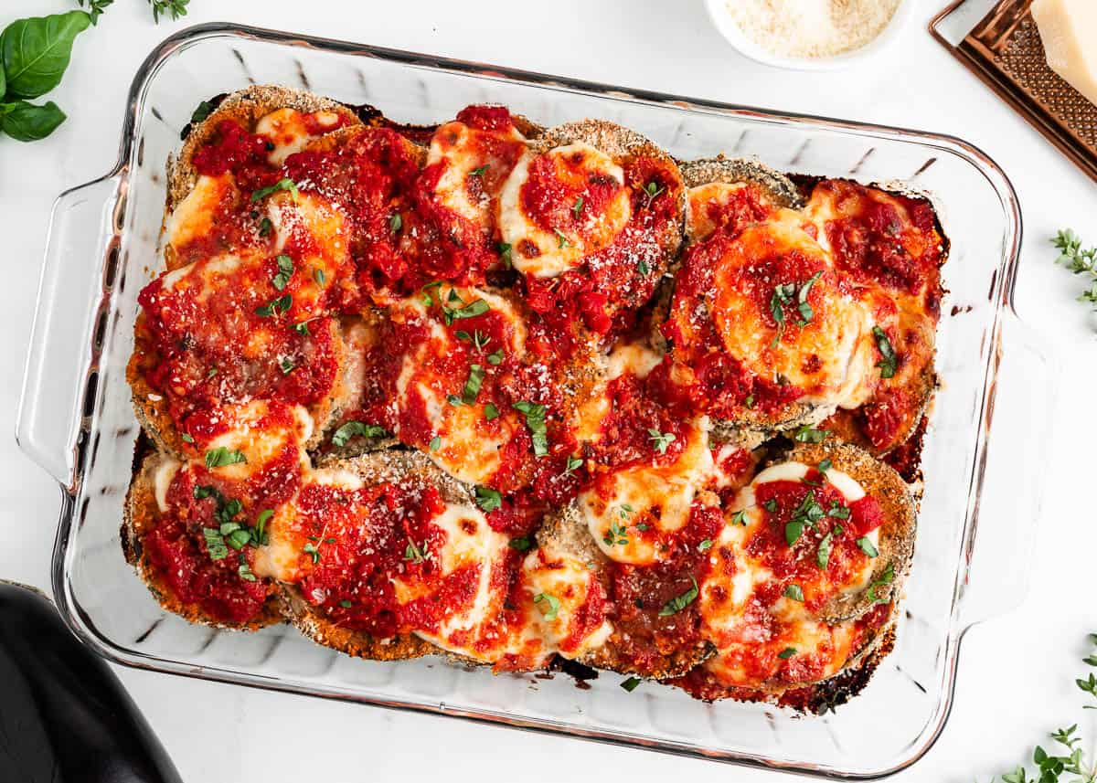 Eggplant parmesan in a glass dish.