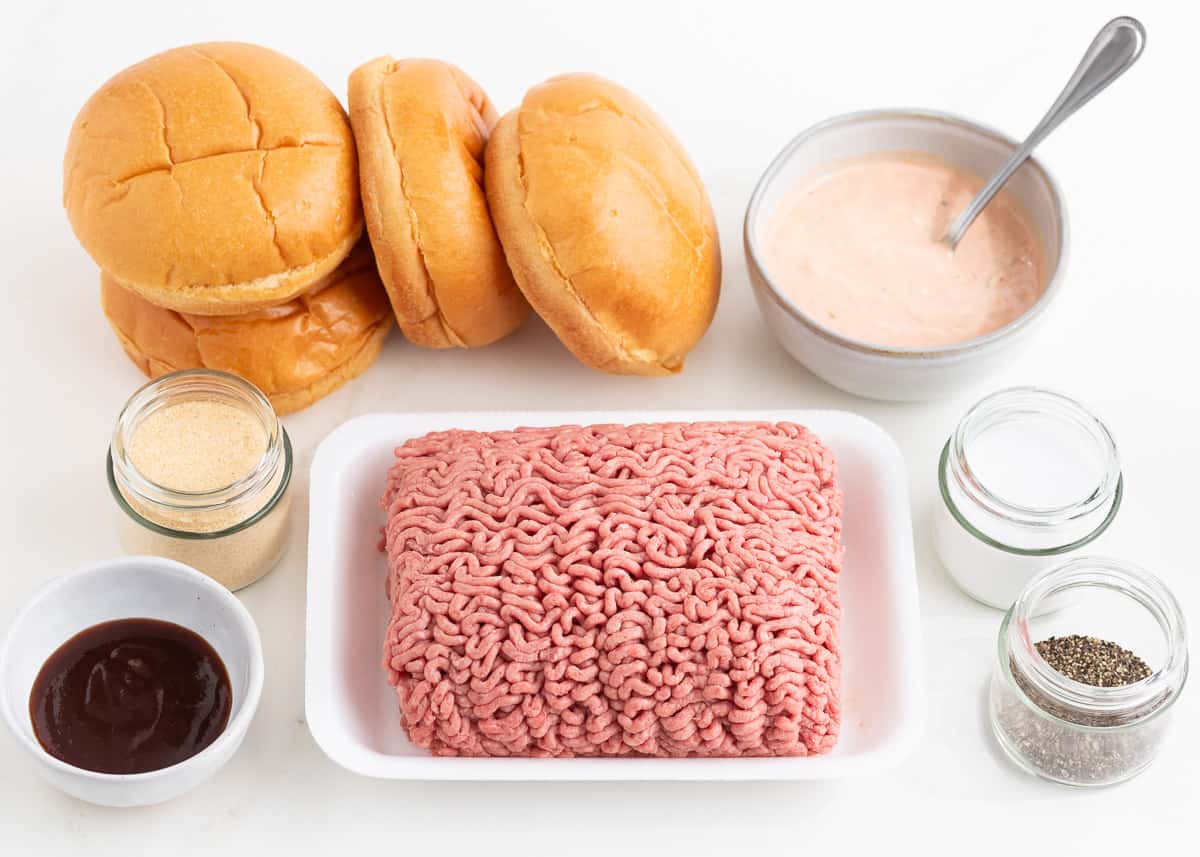 Hamburger ingredients on counter.