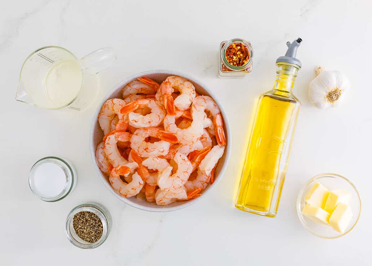 Shrimp scampi ingredients on counter.