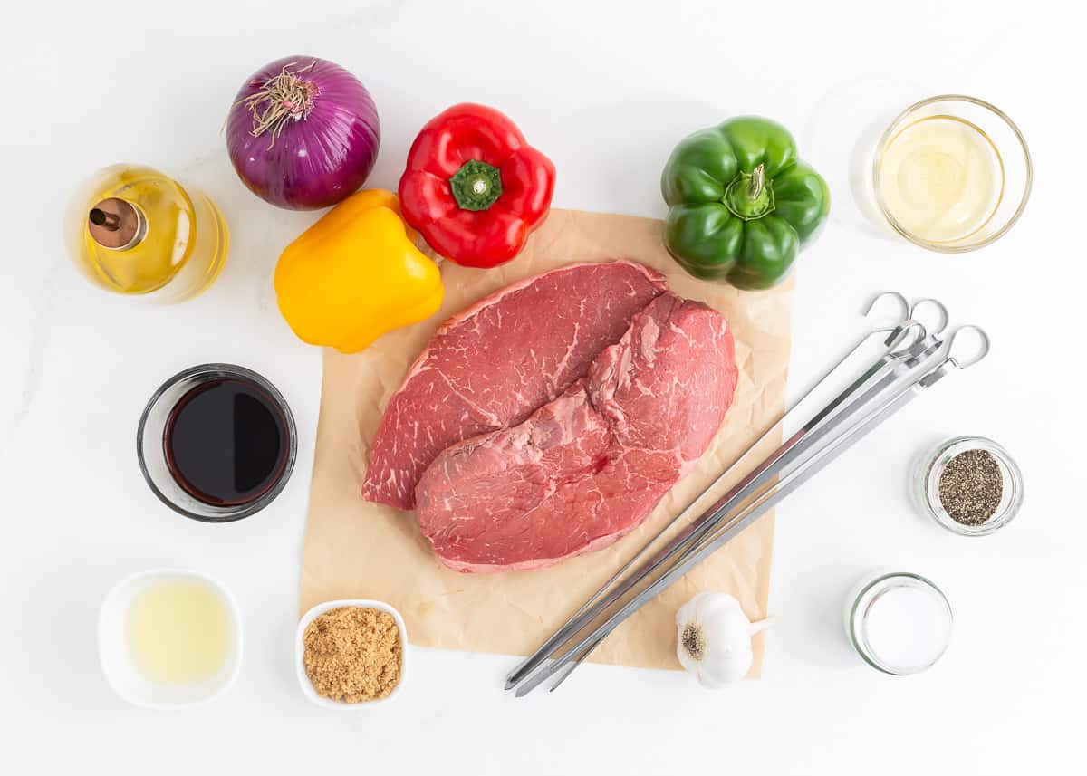 Steak kabob ingredients on counter.