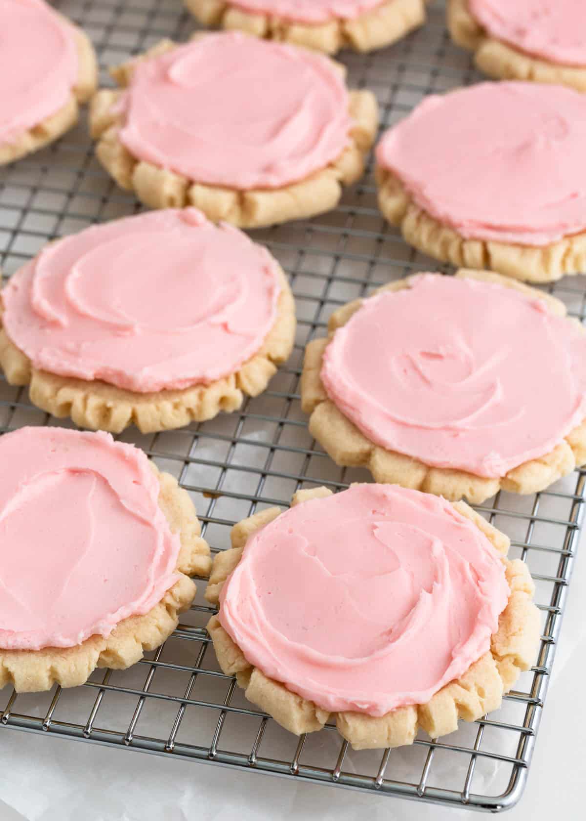 Swig cookies on a wire cooling rack.