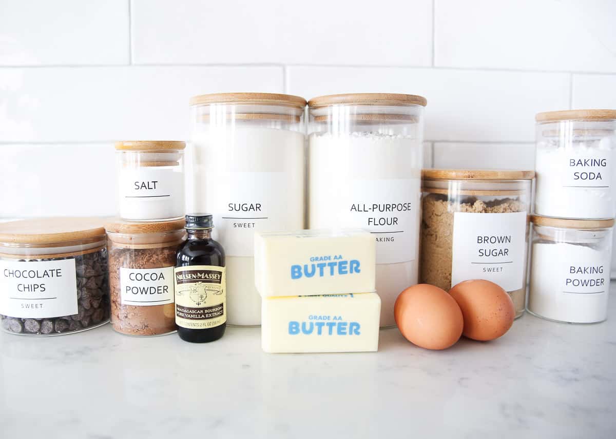Flour, sugar, brown sugar, eggs, butter, cocoa powder, chocolate chips, eggs, baking soda and baking powder.