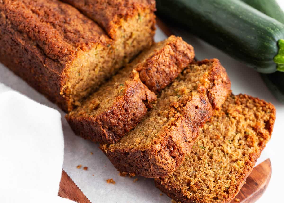 Sliced zucchini bread on counter.