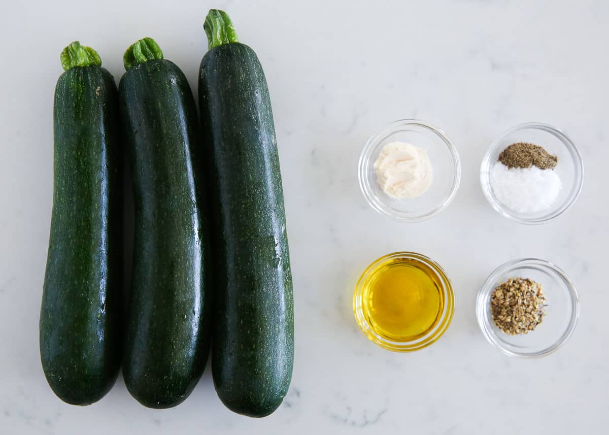 Grilled zucchini ingredients on a counter.