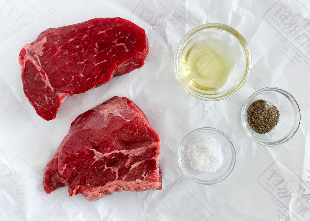 Sirloin steak ingredients on counter.