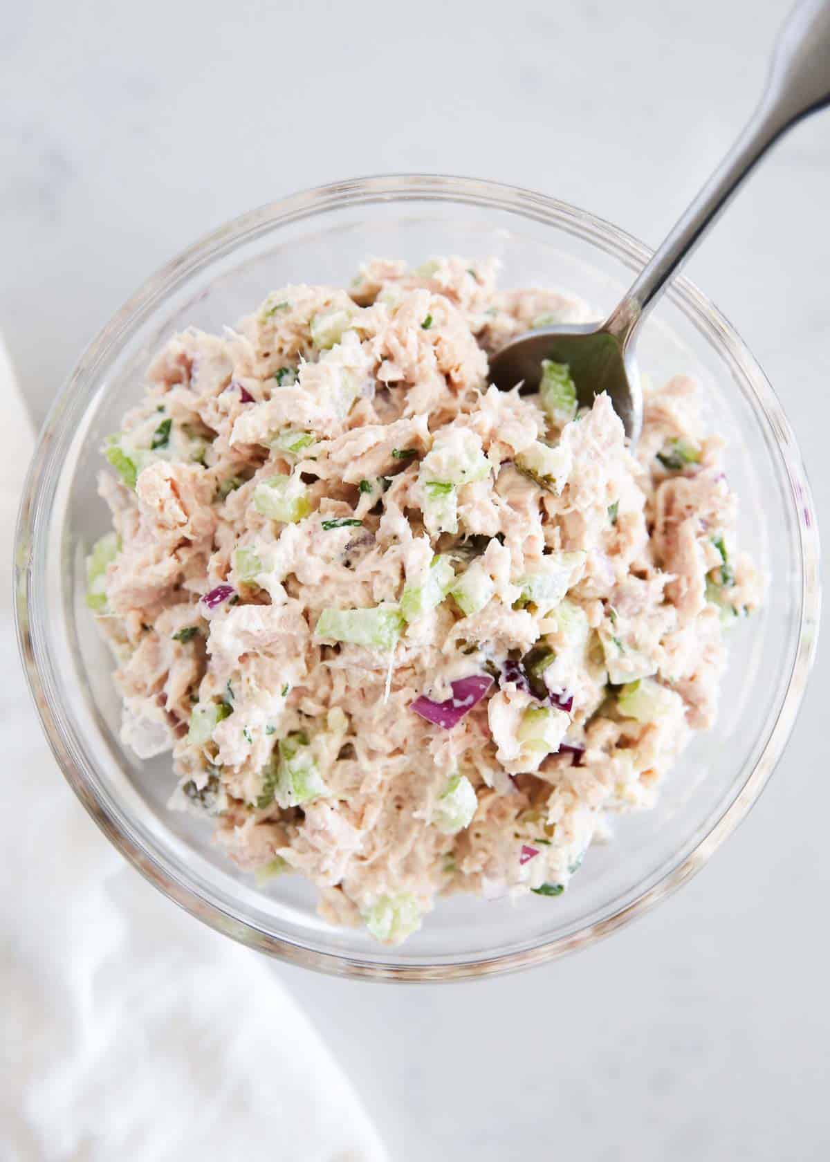 Tuna salad in a glass bowl.