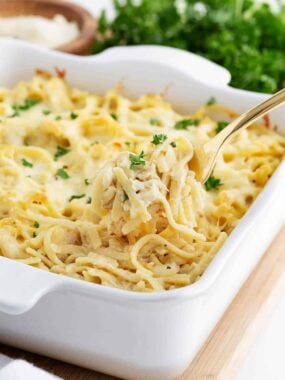 Chicken tetrazzini in a white baking dish.