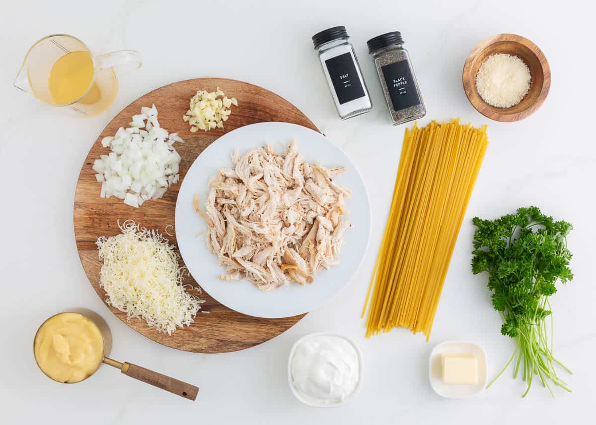 Chicken tetrazzini ingredients on counter.