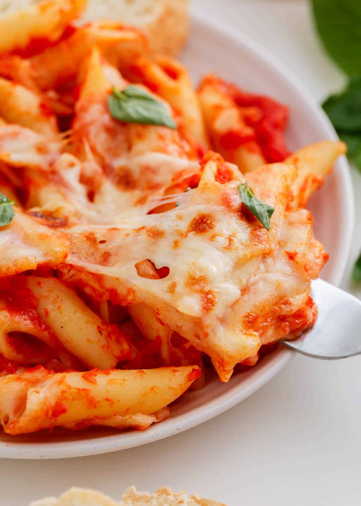Baked mostaccioli on a plate.
