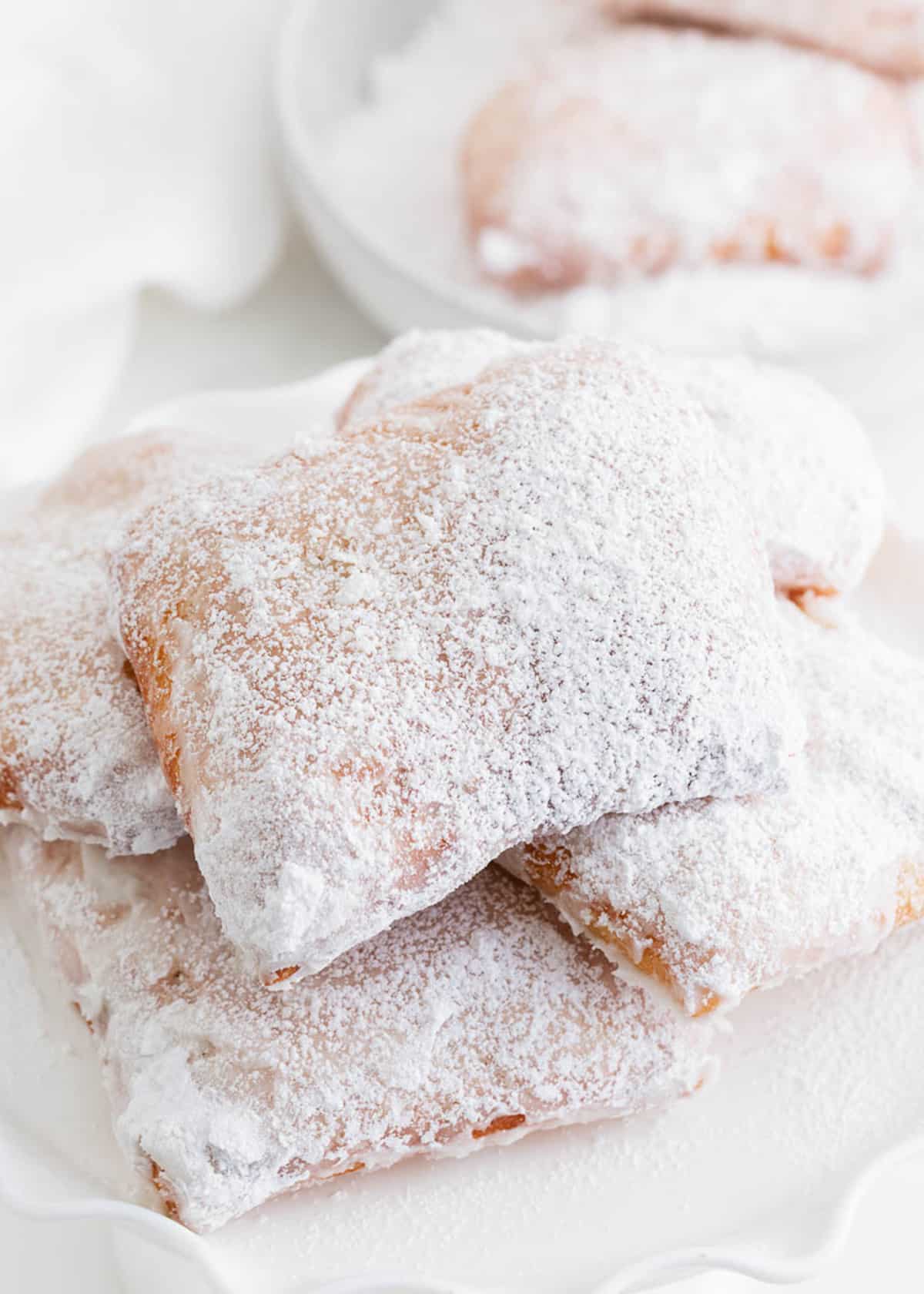 New Orleans Beignets on a white plate.