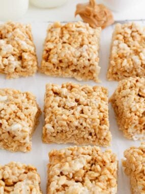 Peanut butter rice krispie treats on countertop.