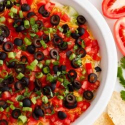 Taco dip in a white dish.