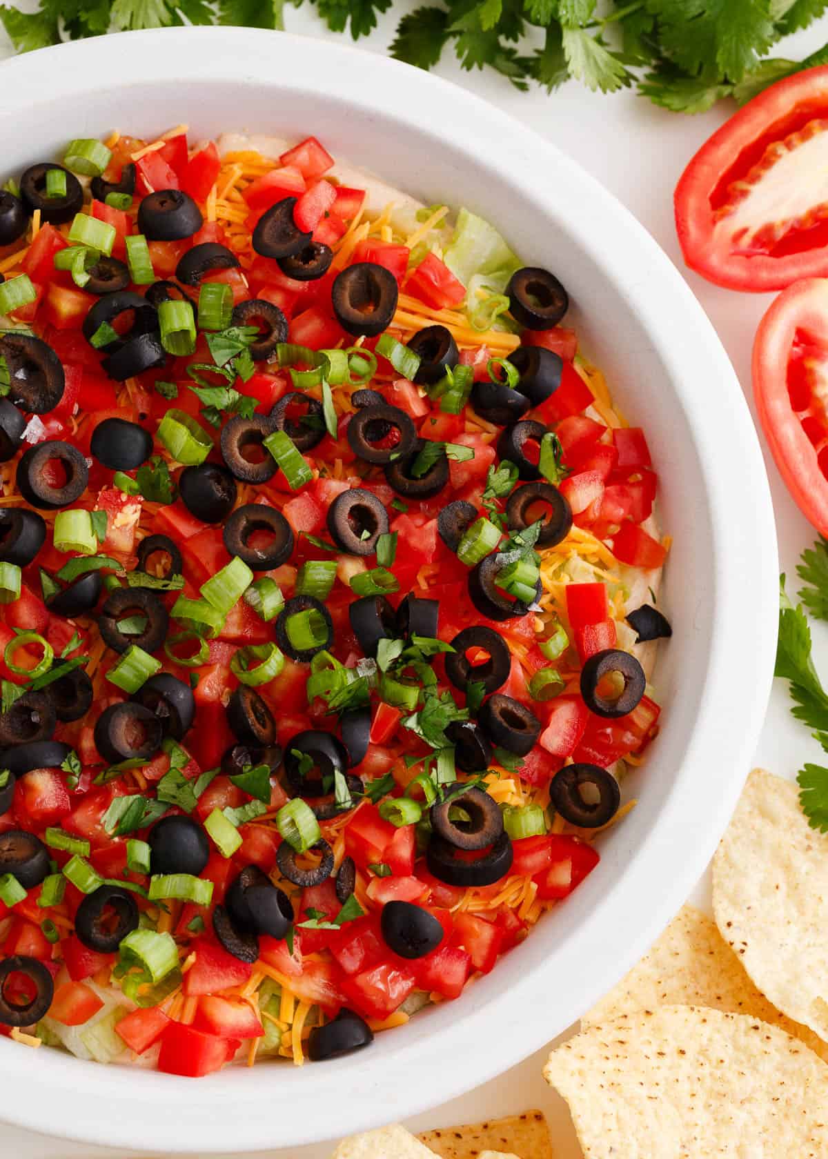 Taco dip in a white dish.