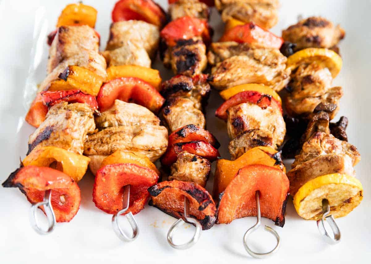 Chicken kabobs on a tin foil. 