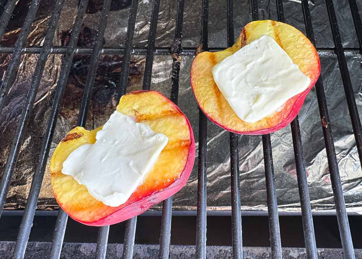 Grilled peaches with butter.