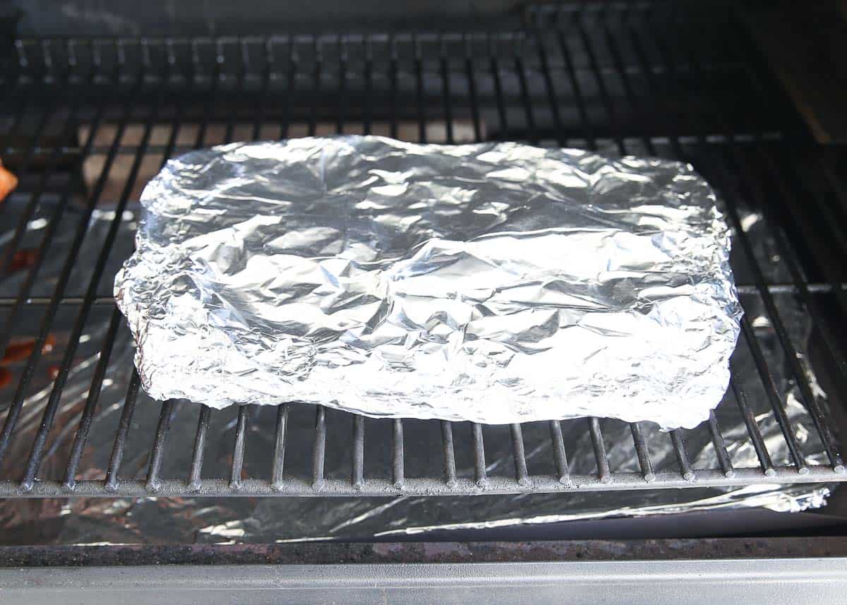 Potato packet on grill.