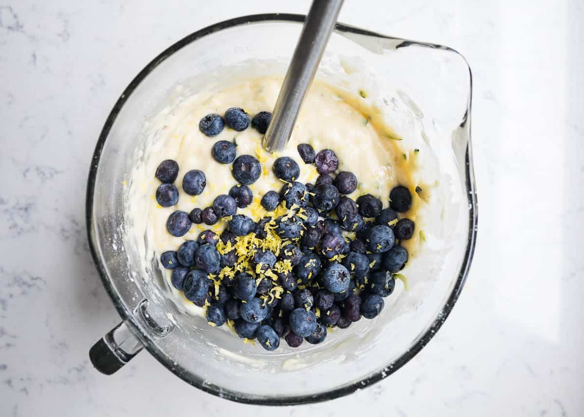 Bowl full of lemon zucchini blueberry bread. 