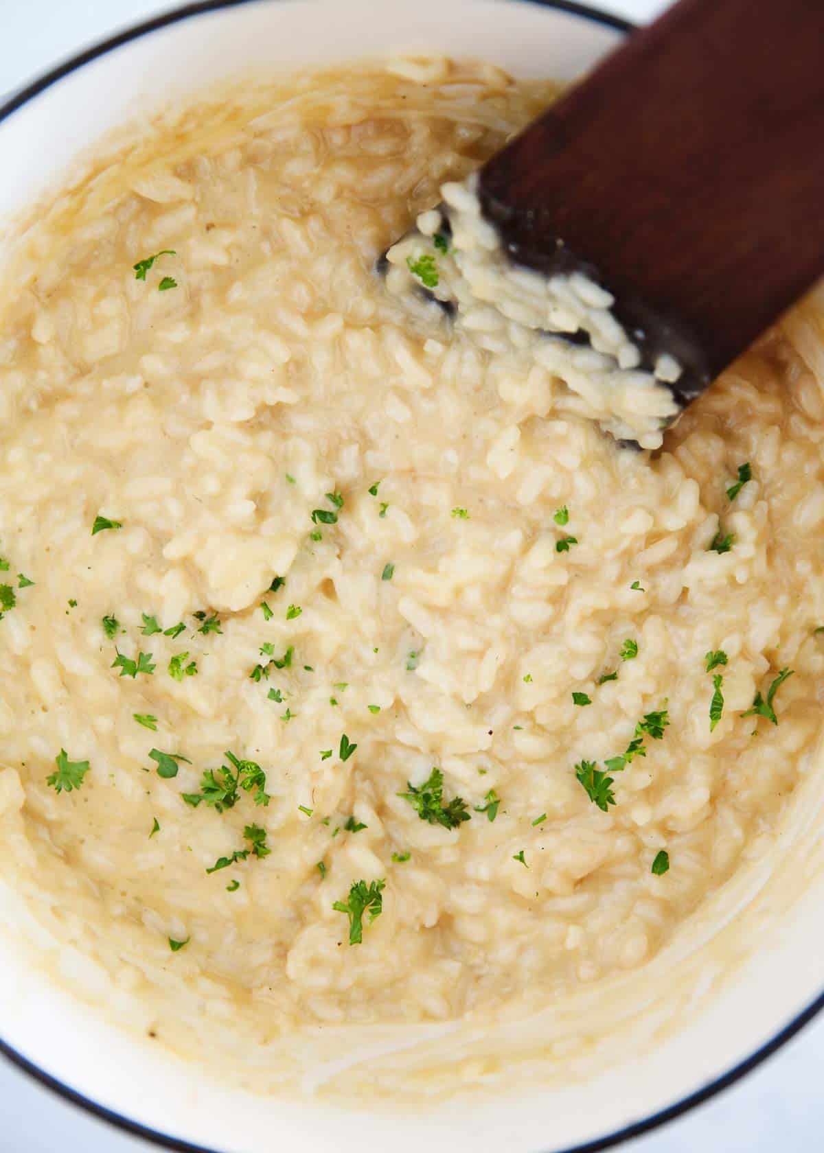 Risotto in a white pot.