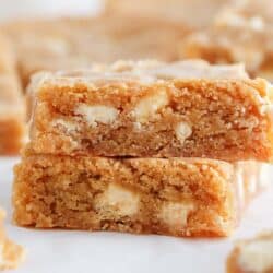 Stack of blondies on a paper.