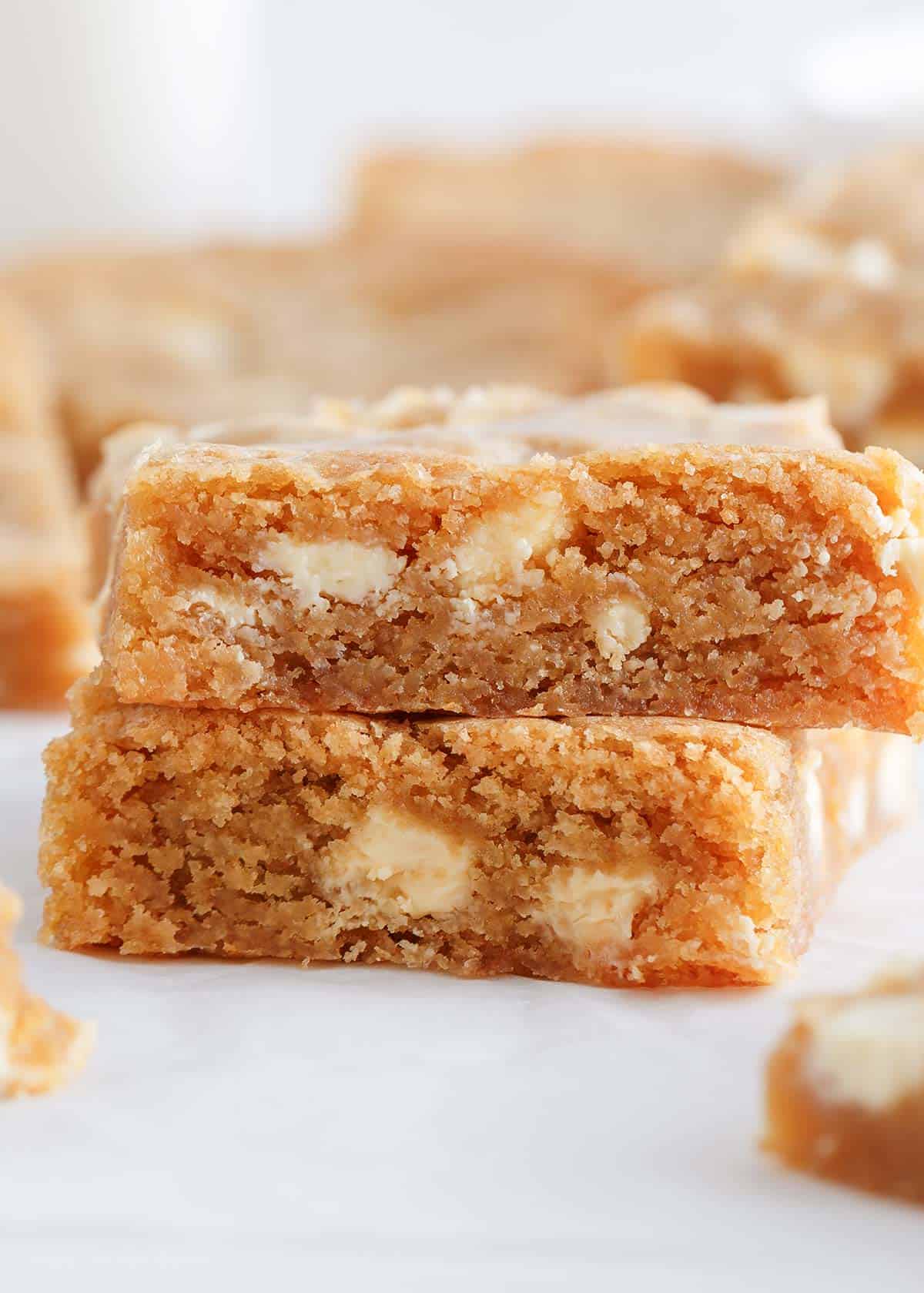 Stack of blondies on a paper.