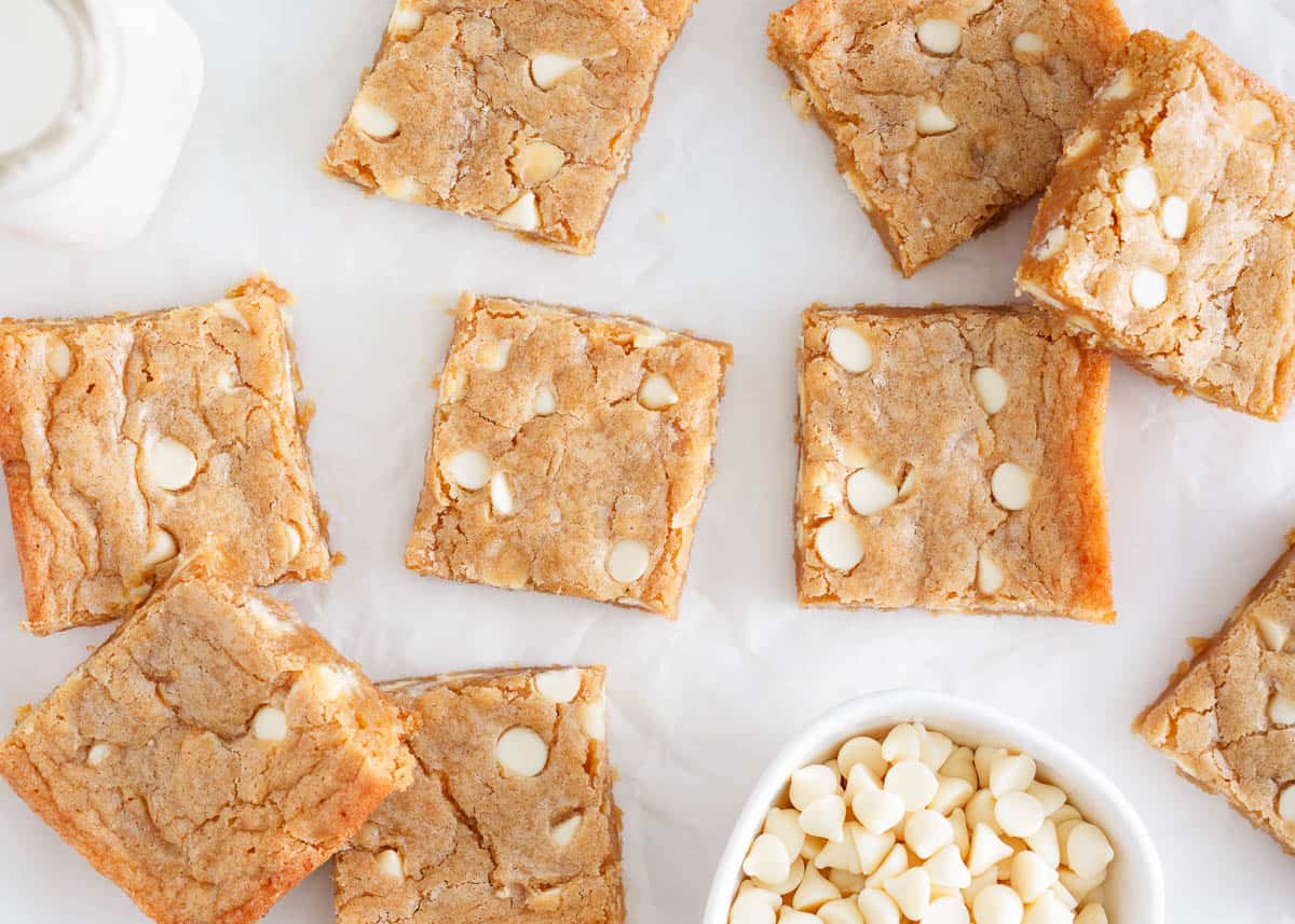 Blondies on a piece of parchment paper.