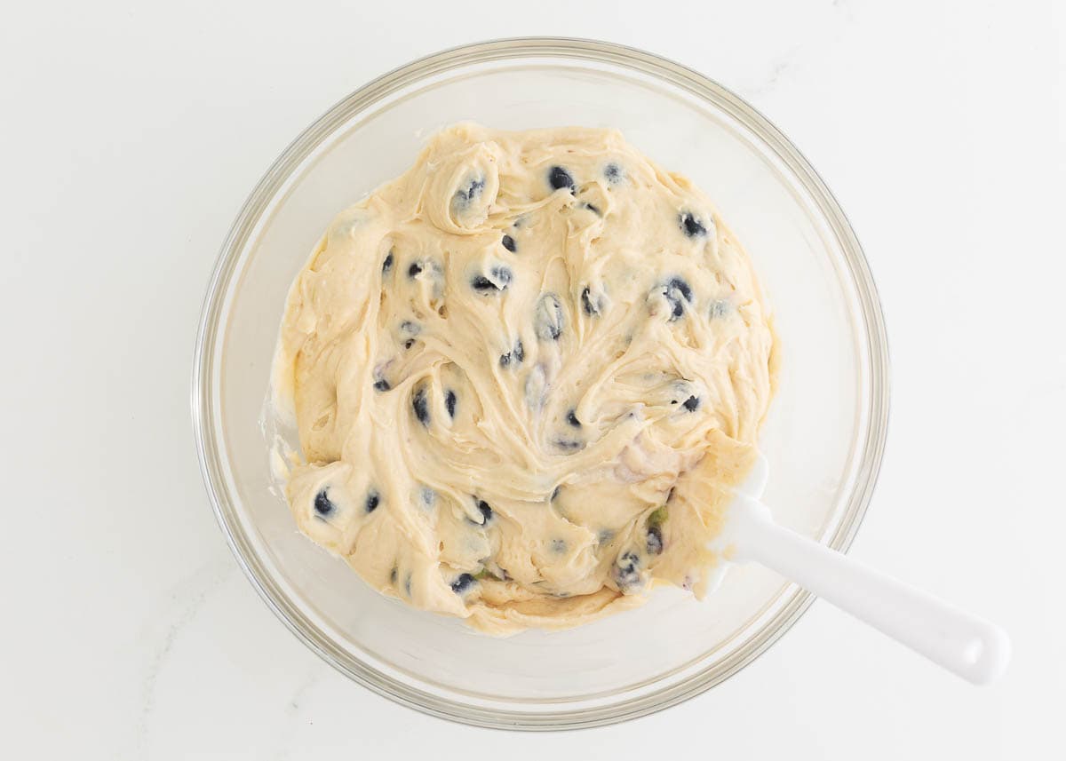 Blueberry muffin batter in a bowl.