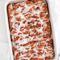 Cinnamon roll casserole in a white dish.