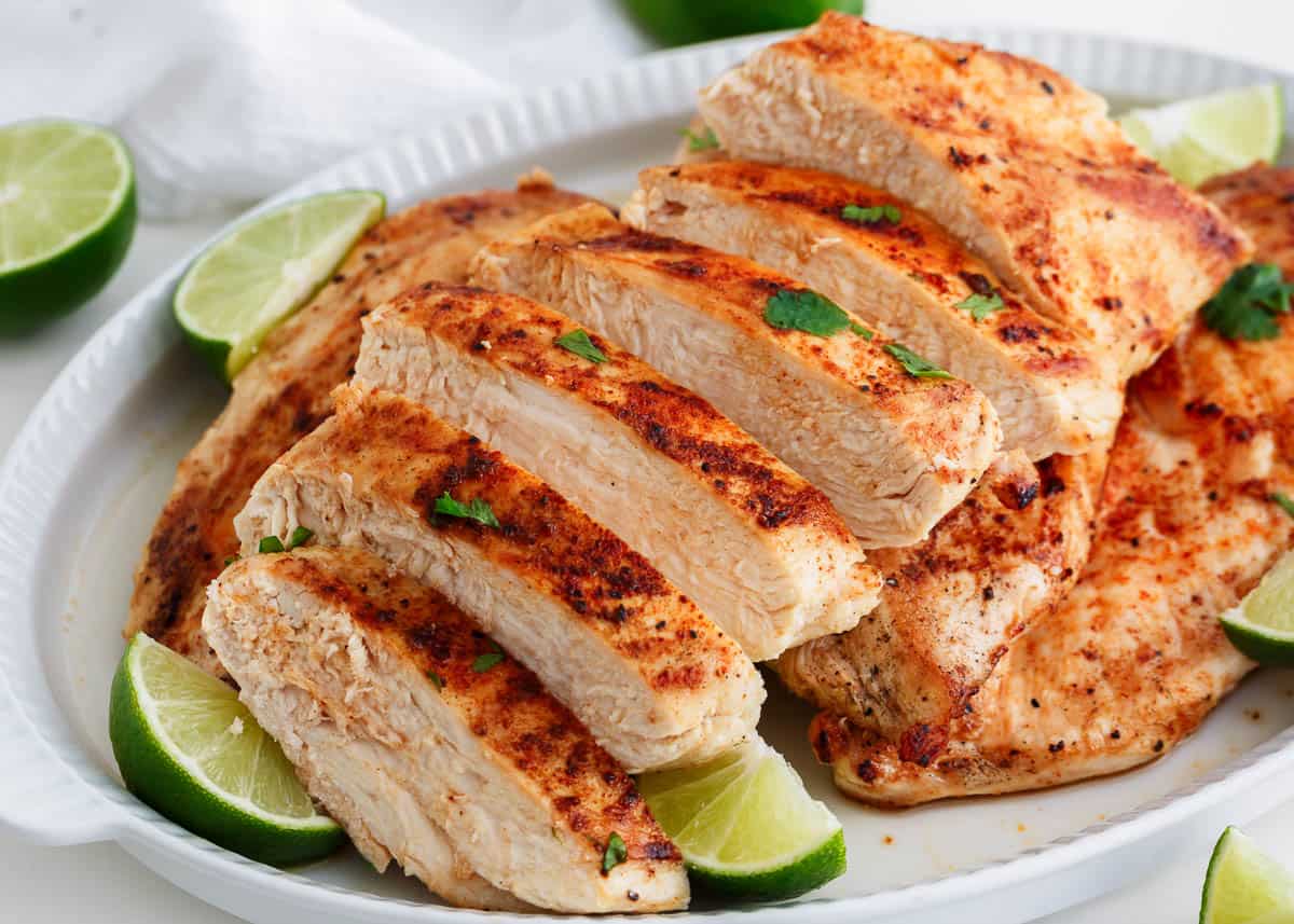 Sliced chicken breast on a plate.