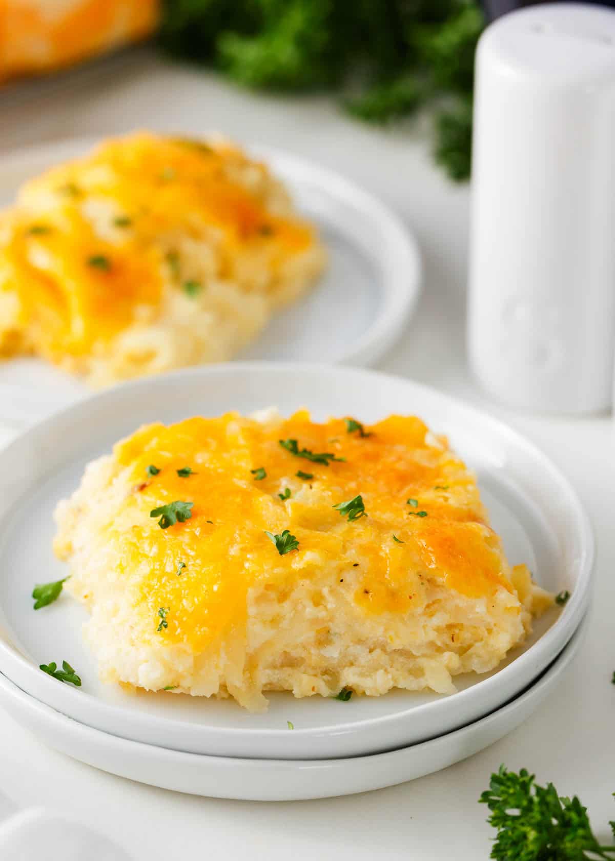 Hashbrown casserole on a white plate.