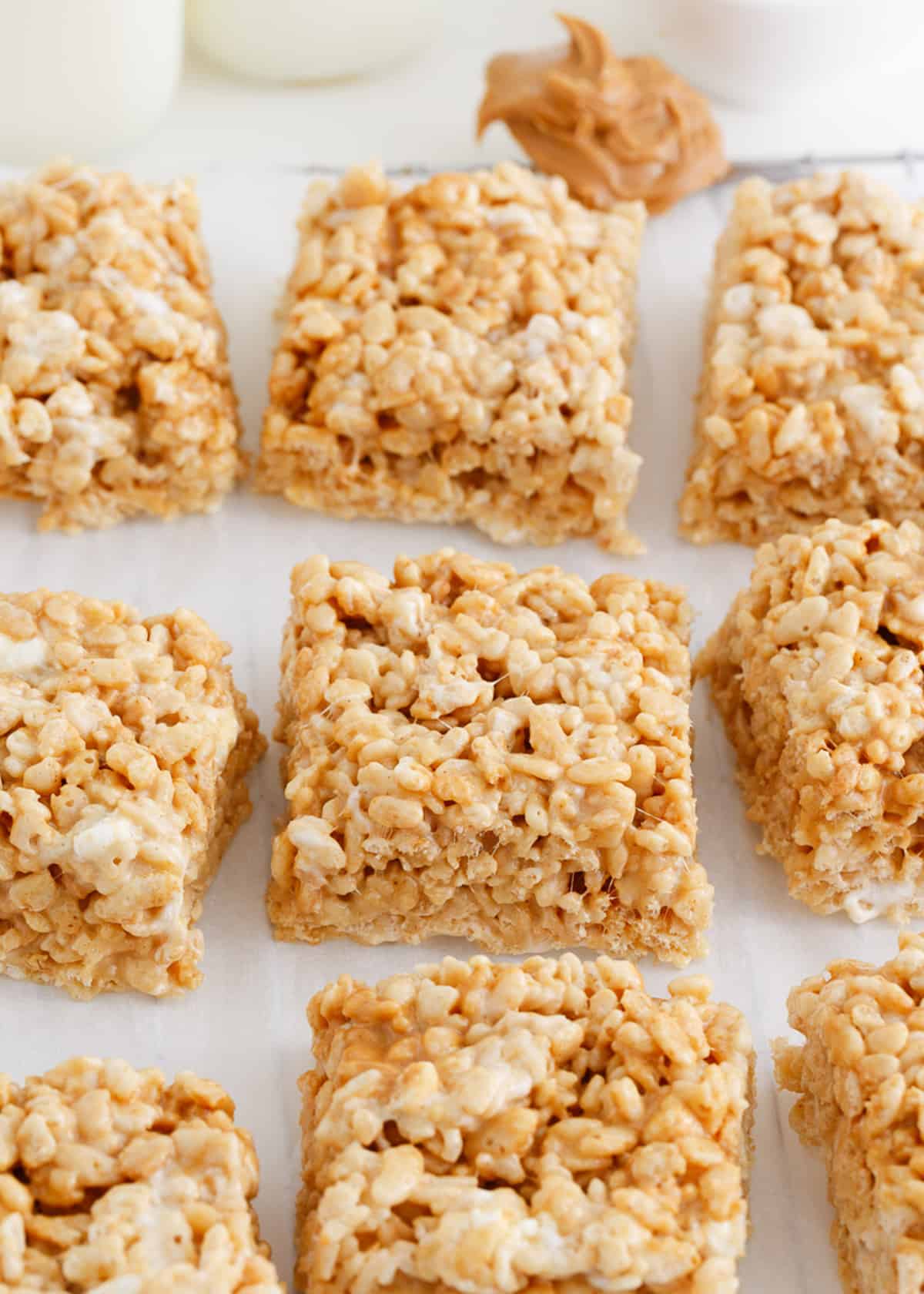 Peanut butter rice krispie treats on countertop.