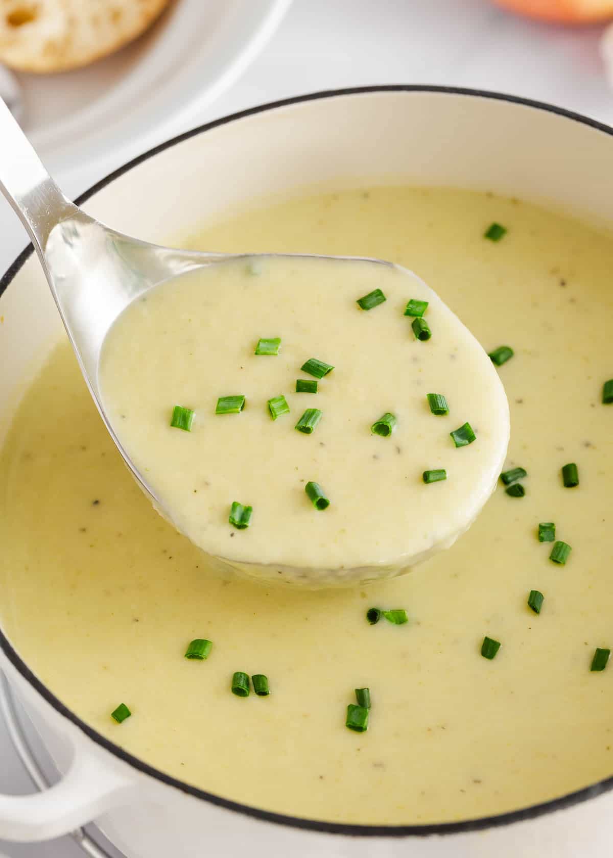 Ladle of potato leek soup.